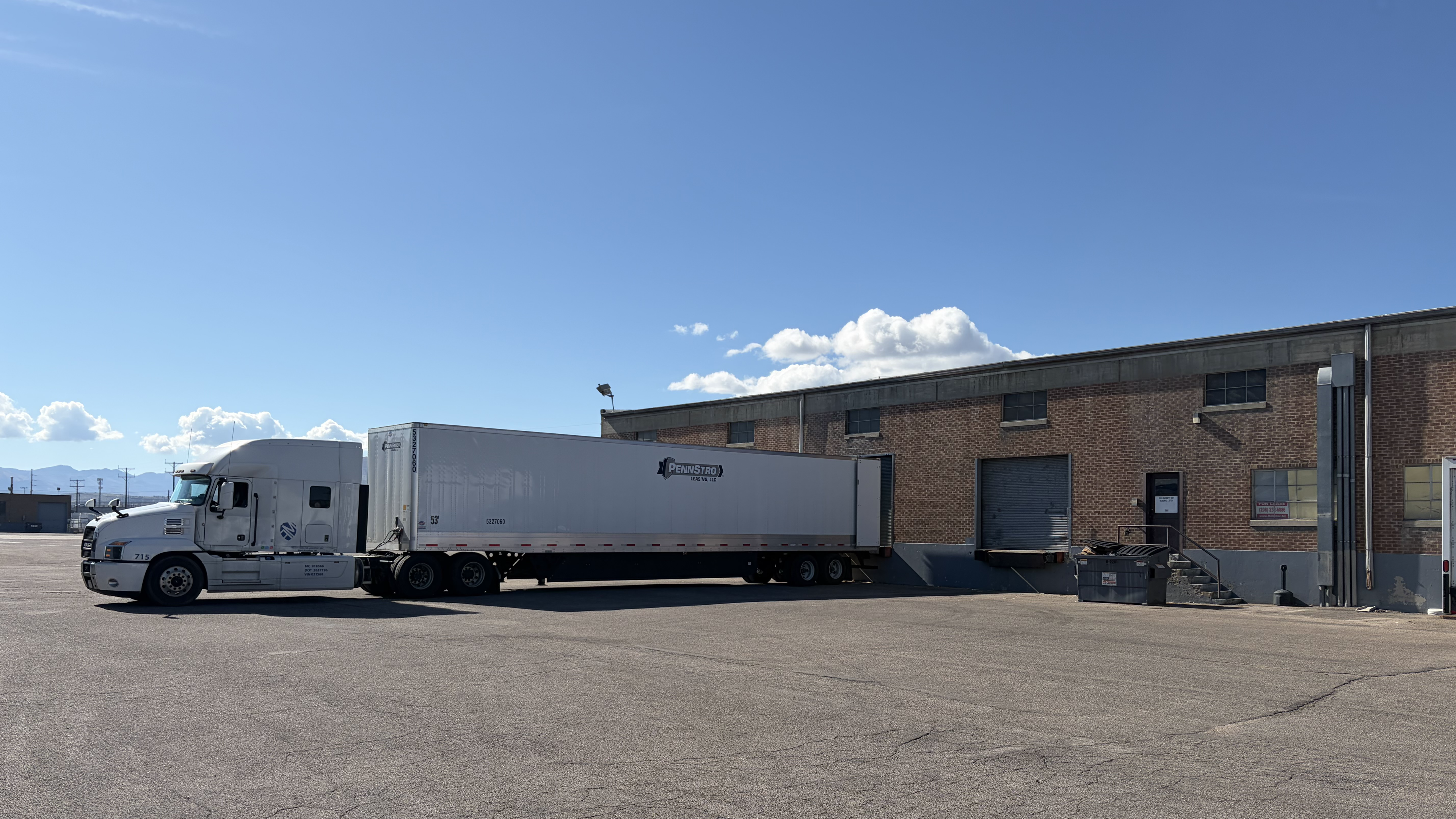 Commercial tractor-trailer backed to the Pocatello Crossdock facility